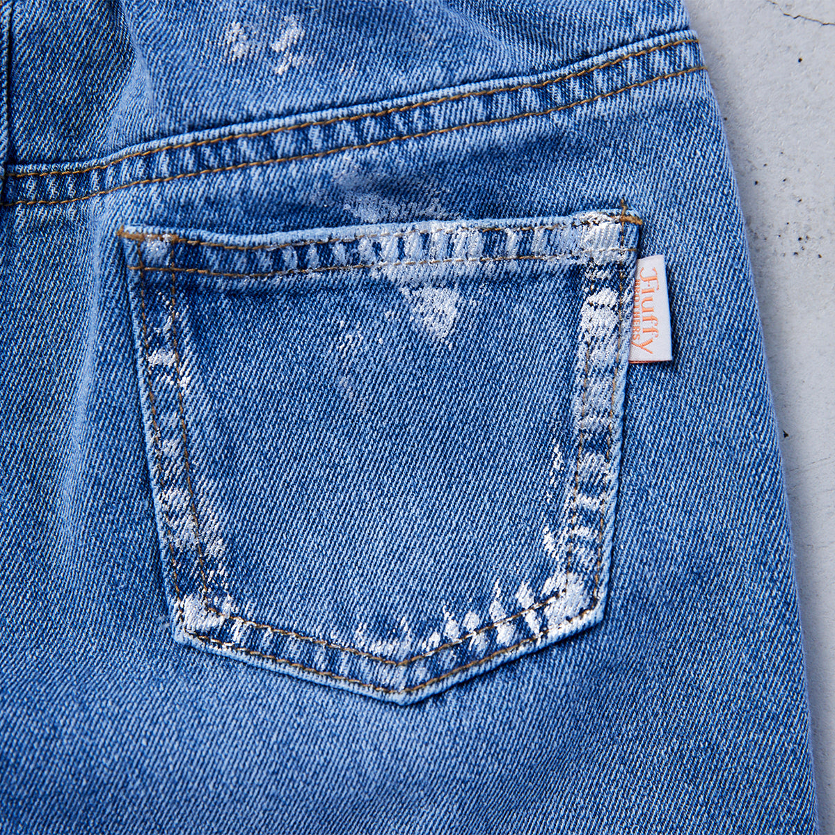 箔プリントデニムパンツ