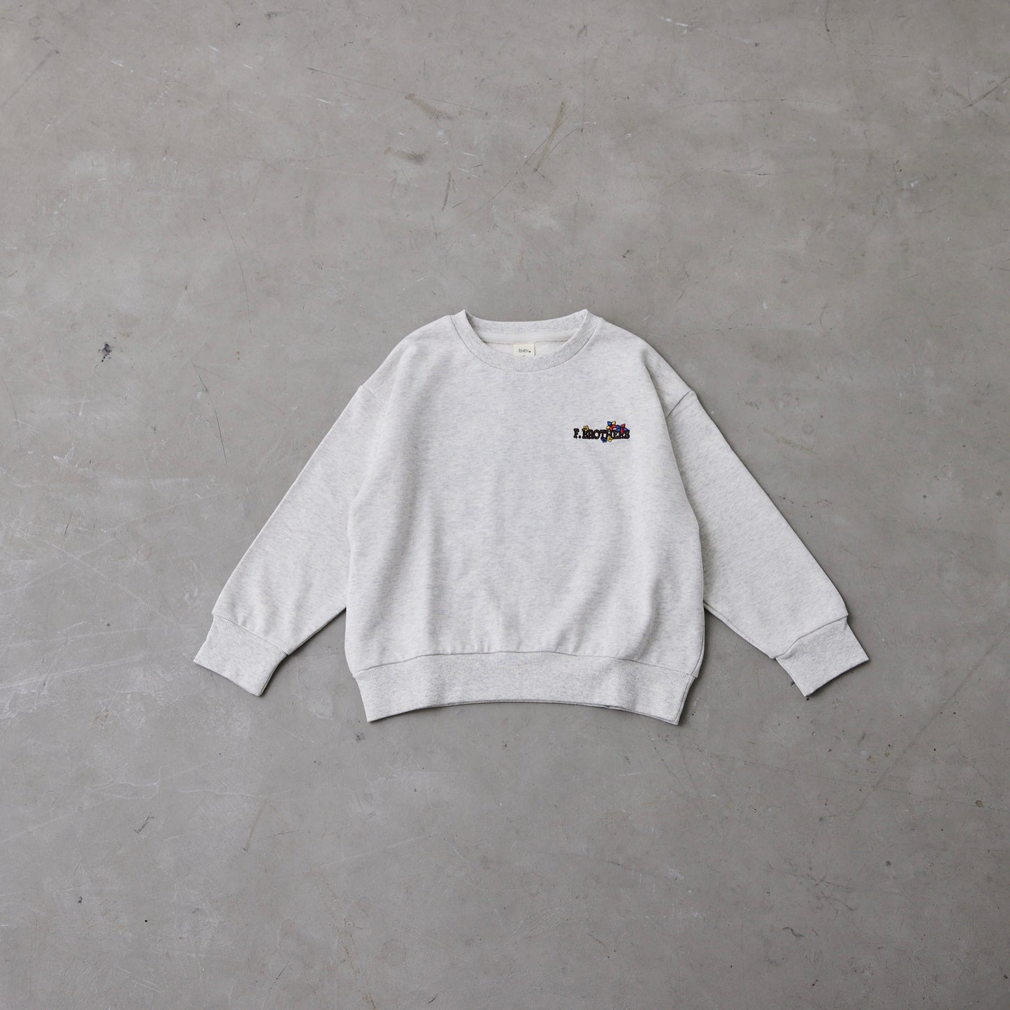 花ロゴ刺繍トレーナー