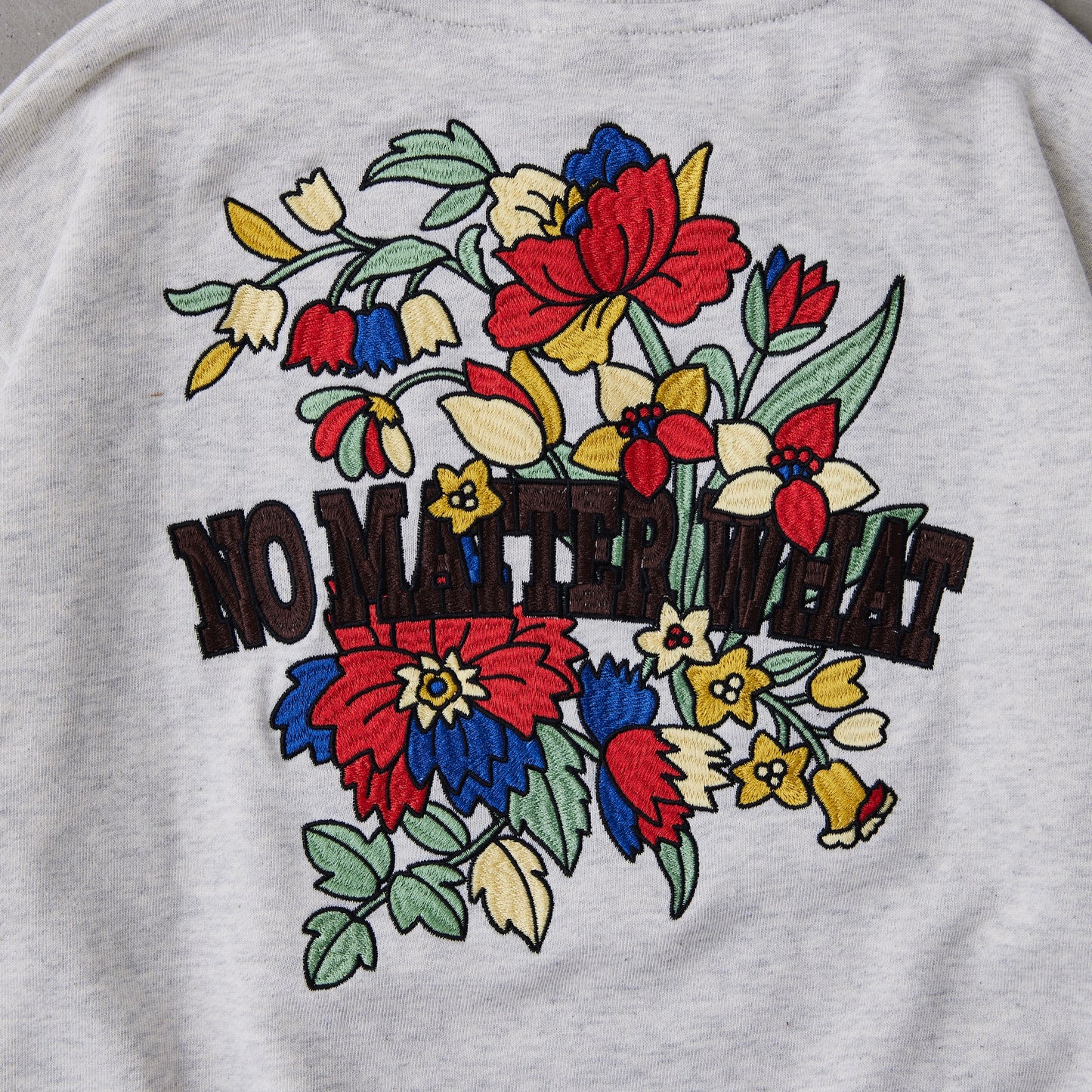 花ロゴ刺繍トレーナー