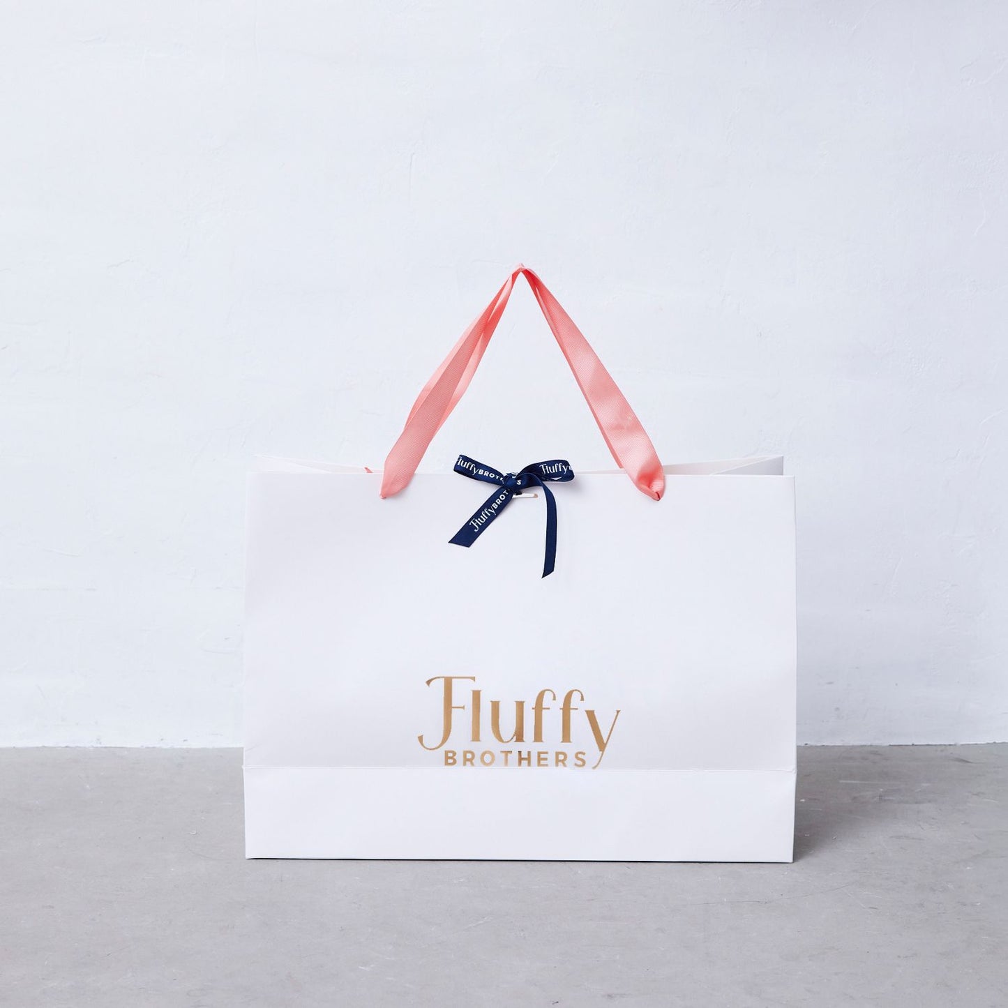 ロゴ入り紙袋(リボン付き)　L